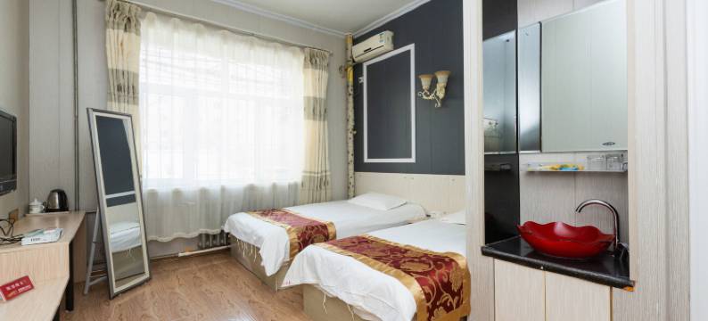 喜洋洋快捷宾馆(哈尔滨工大店)图片