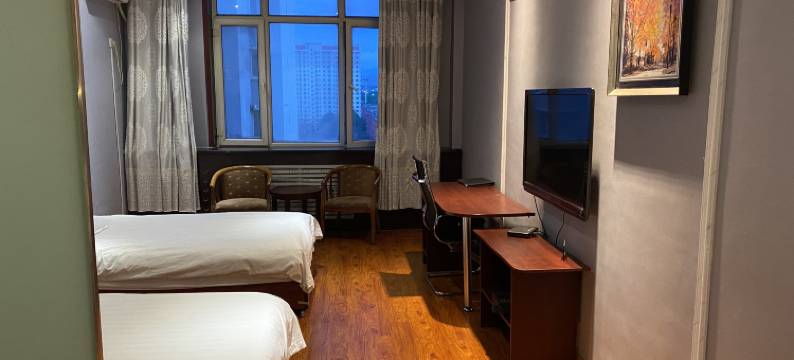 东鑫宾馆(石河子开发区汇林大厦店)图片