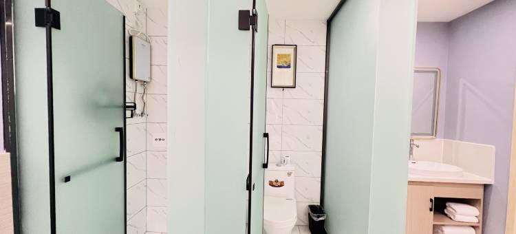 喜悦石榴酒店(财经大学体育中心店)图片