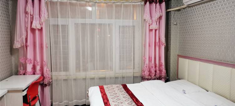 鹤岗罗马假日快捷宾馆图片