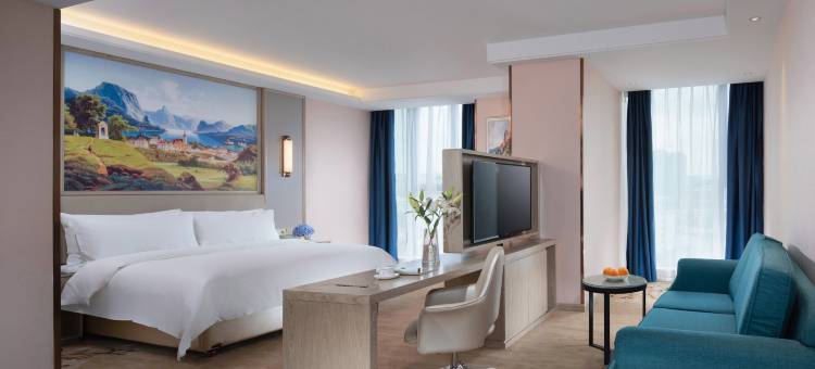 维也纳国际酒店(绿地东海岸可乐村地铁站店)图片