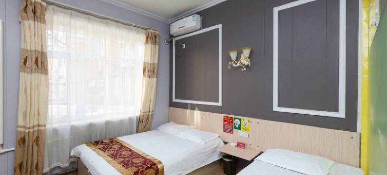 喜洋洋快捷宾馆(哈尔滨工大店)图片