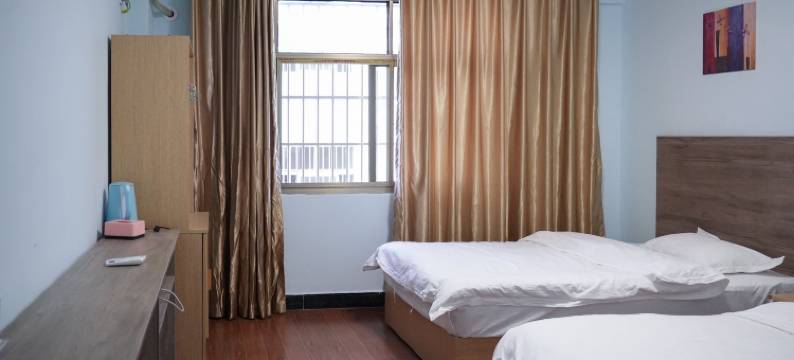 芒果御园酒店(景洪曼听公园店)图片