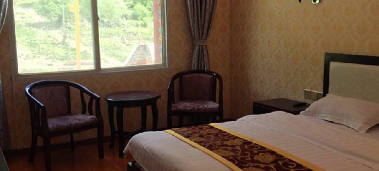 新龙梁昂孜荣大酒店图片