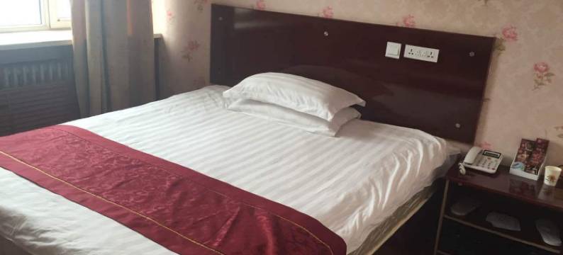 石河子新客源商务宾馆图片