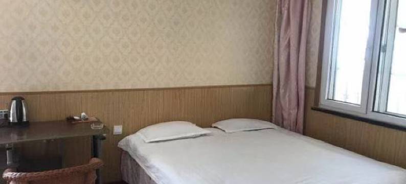 青岛家暖宾馆图片