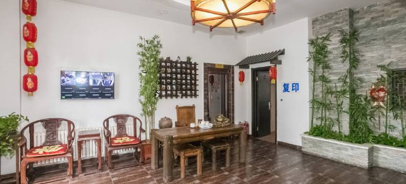 哈尔滨钱柜时尚宾馆(黑龙江中医药大学附属第一医院店)图片