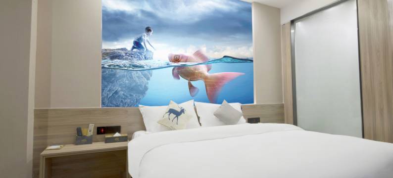 佛山迷你时空酒店(狮山广场南海体育中心店)图片