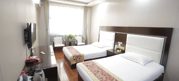 河曲鸣三省商务酒店图片