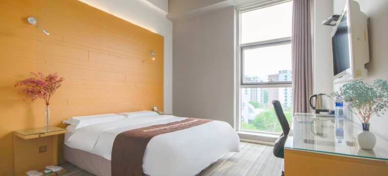 东伍·拾捌酒店(天津市滨海国际机场肿瘤医院空港医院店)图片