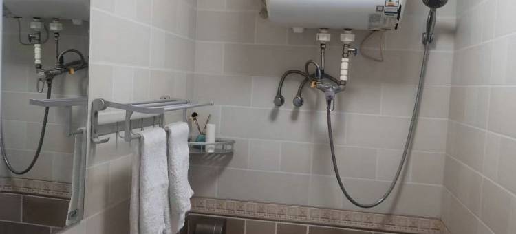 新民鑫比家馨便捷旅馆图片