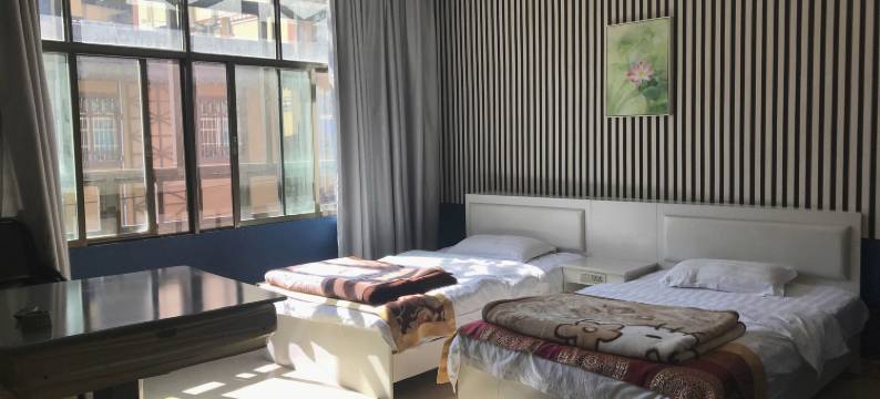 绿春乐恒主题酒店图片