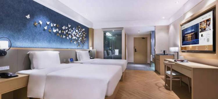 青岛崂山区石老人海水浴场桔子水晶酒店图片