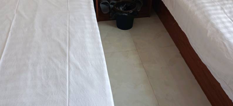 新明雪宾馆(岚山日百万德福店)图片