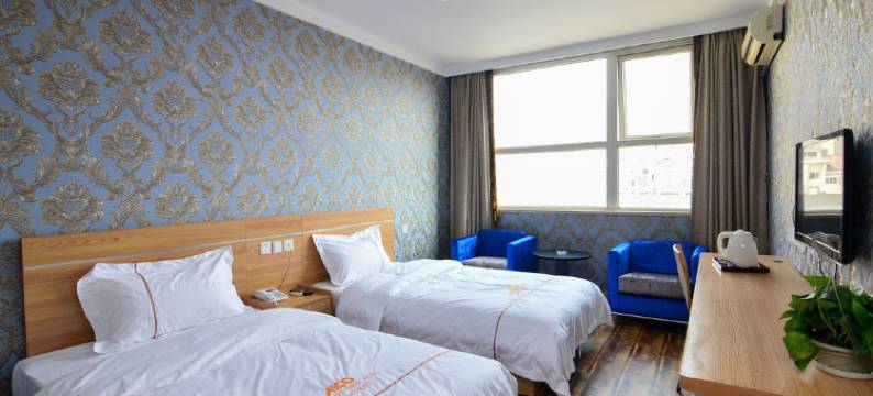 爱客100主题酒店(青岛李村步行街李村地铁站店)图片