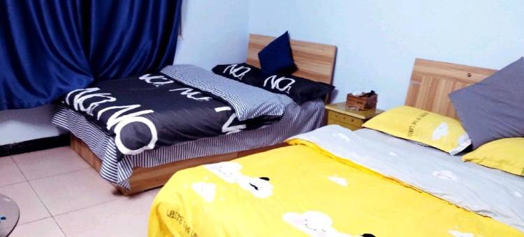 驿旅阳光客栈(武汉纺织大学外经贸学院藏龙岛校区光谷职业学院店)图片