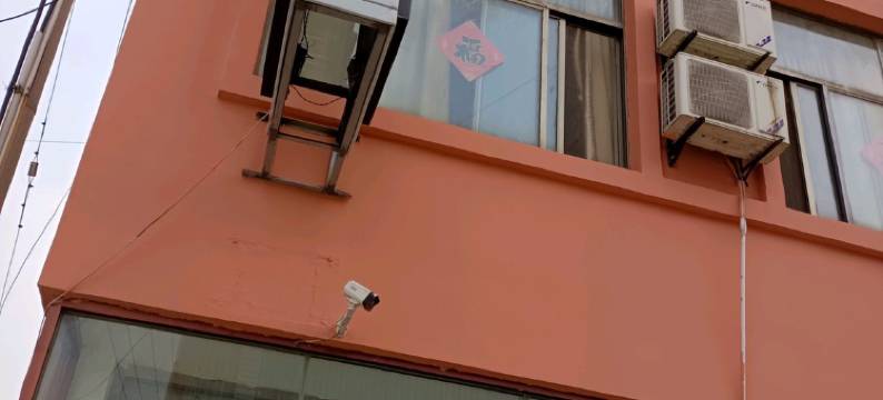 新明雪宾馆(岚山日百万德福店)图片