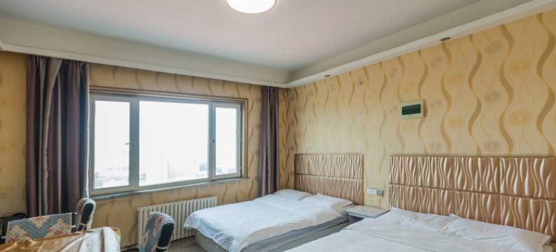 七彩假日酒店式公寓(哈尔滨服装城店)图片