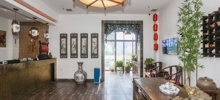 哈尔滨钱柜时尚宾馆(黑龙江中医药大学附属第一医院店)图片