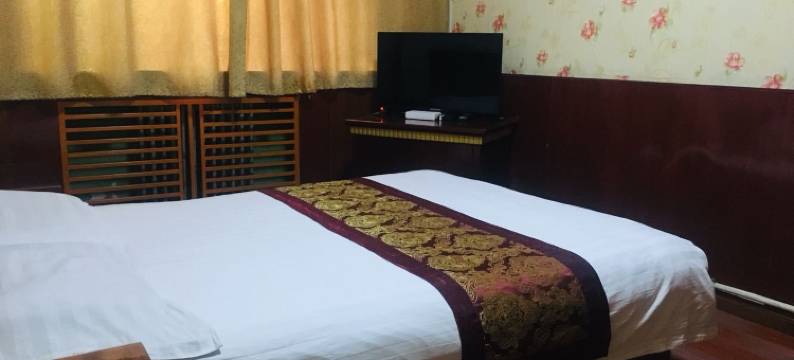 酒泉红丹丹小宾馆(酒泉鼓楼汉唐美食街店)图片