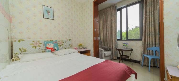 成都新龙都旅馆(龙泉驿地铁站店)图片