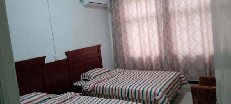 界首田缘宾馆图片