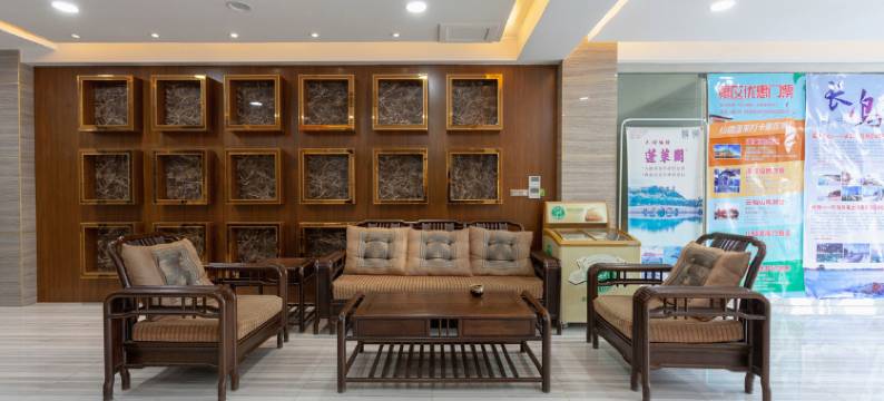 万华晟居宾馆(蓬莱新汽车站店)图片