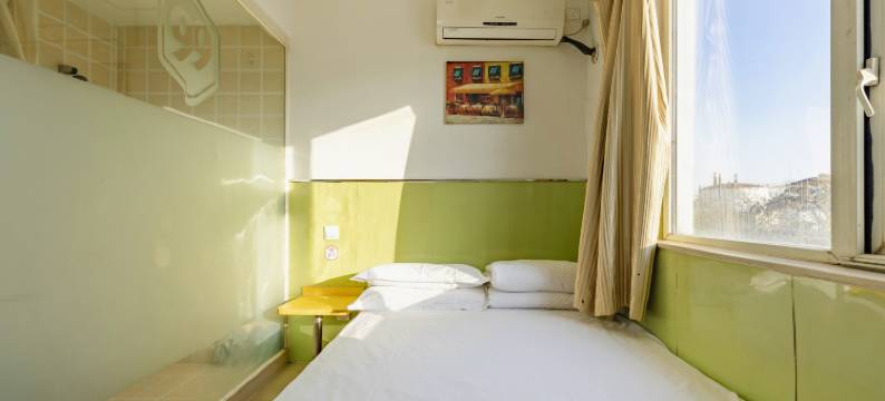 天津玖玖旅馆(滨海高铁站店)图片