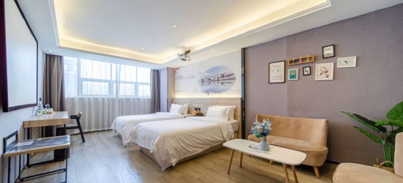 迷白艺术酒店(苏州吴江盛泽东方纺织城店)图片