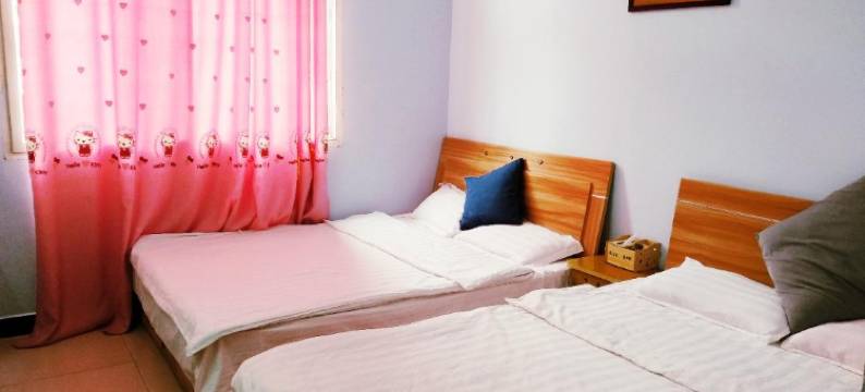 驿旅阳光客栈(武汉纺织大学外经贸学院藏龙岛校区光谷职业学院店)图片