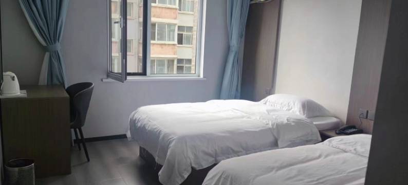 优觅家宾馆(锦州北湖公园石桥子早市店)图片