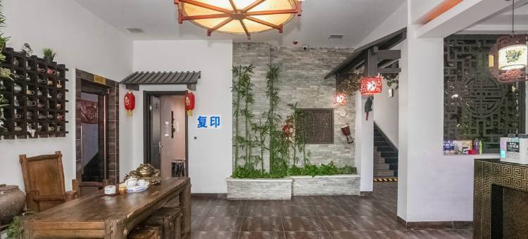 哈尔滨钱柜时尚宾馆(黑龙江中医药大学附属第一医院店)图片