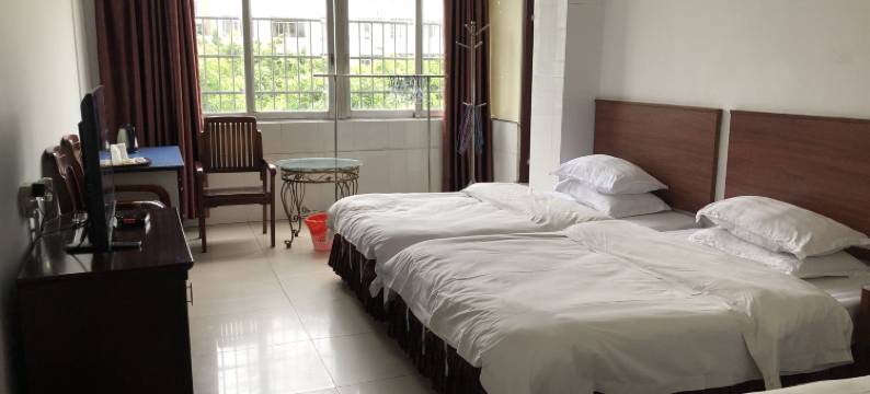 西环旅业(玉林市第二人民医院金色阳光购物广场店)图片