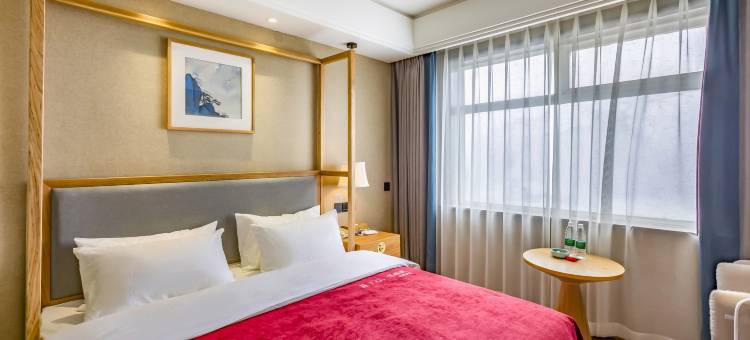 仟那旅途酒店(正阳店)图片