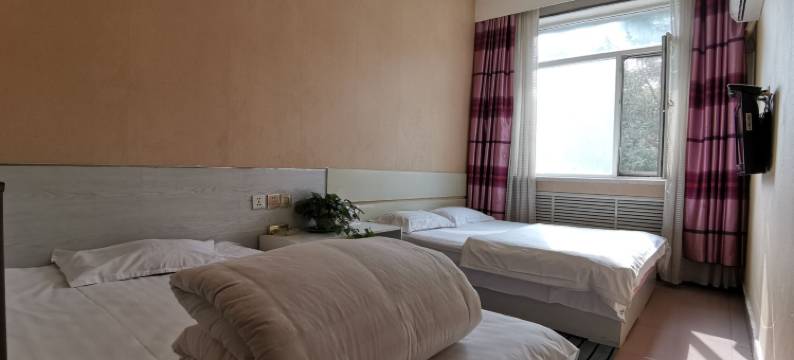 双新快捷宾馆(新民工人街店)图片