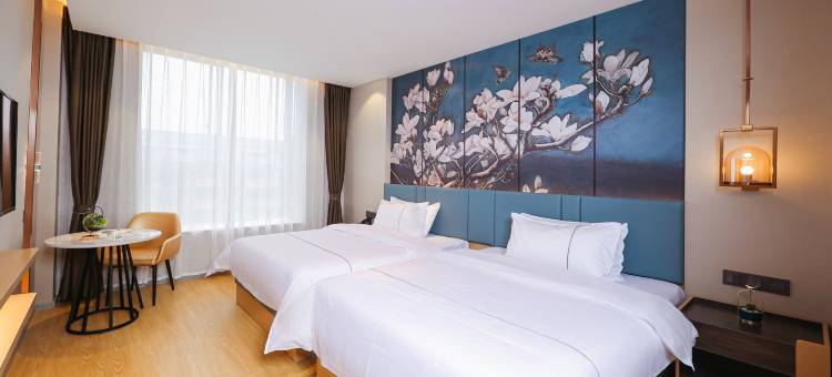 白玉兰酒店(长沙省政府桂花坪地铁站店)图片