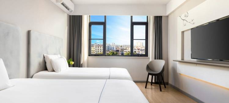 白玉兰酒店(琼海万泉河环球春天广场店)图片