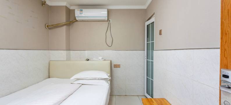 南京一家人宾馆(殷巷新寓诚信大道地铁站店)图片