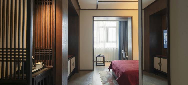 仟那千寻酒店(开封清明上河园星光天地购物中心店)图片