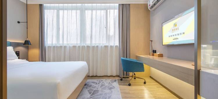 潮漫酒店(深圳宝安体育馆西乡地铁站店)图片