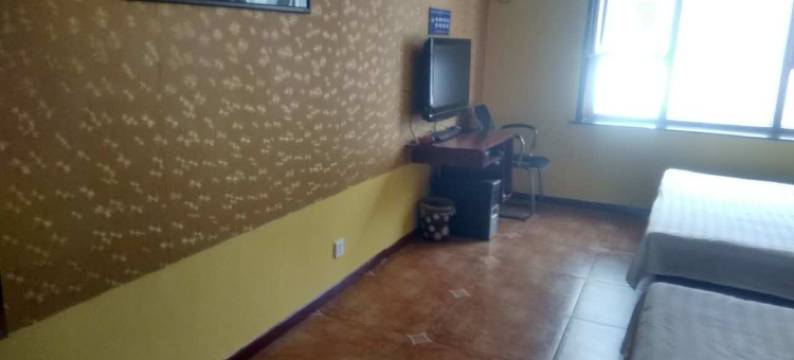 临江喜洋洋时尚旅馆图片