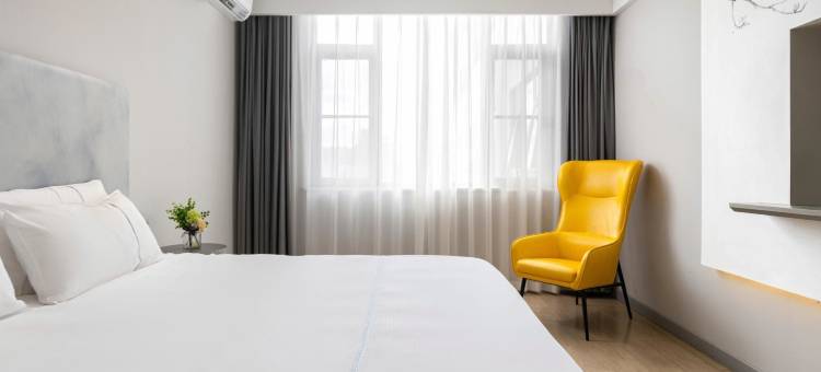 白玉兰酒店(琼海万泉河环球春天广场店)图片