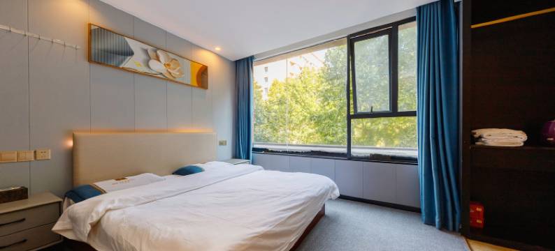 七禧轻居酒店(省体育中心店)图片