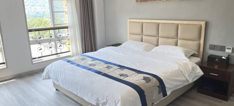 绥江天何酒店图片