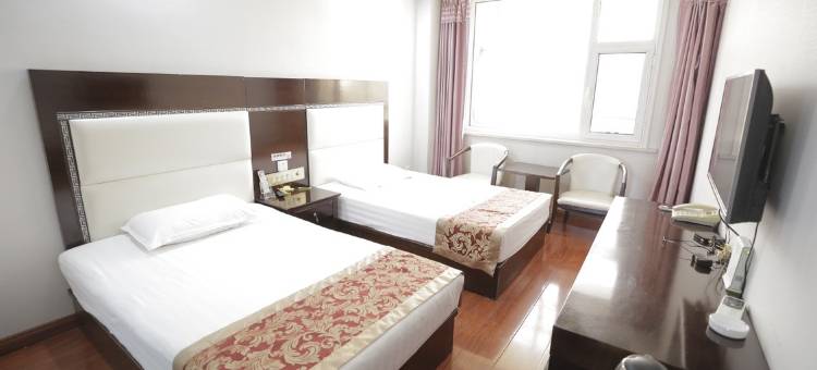 河曲鸣三省商务酒店图片