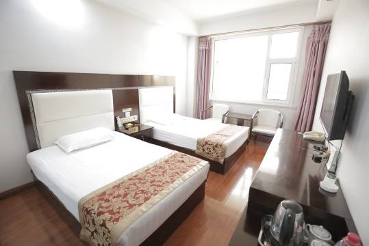 河曲鸣三省商务酒店