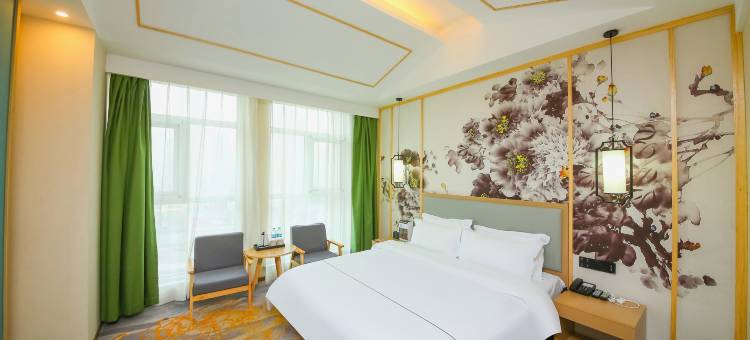 逸美精品艺术酒店(万达广场火车站店)图片