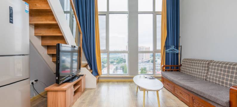 多彩假日酒店公寓(青岛火车北站科技大学四方校区店)图片