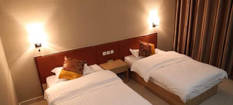 吉木萨尔九州商务酒店图片