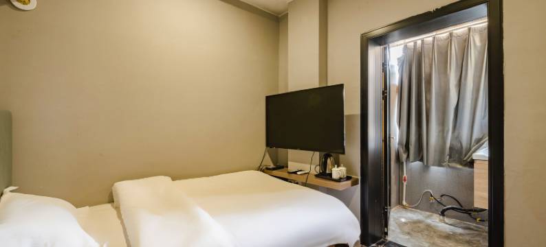 新华唯美客栈(商丘高铁火车站店)图片